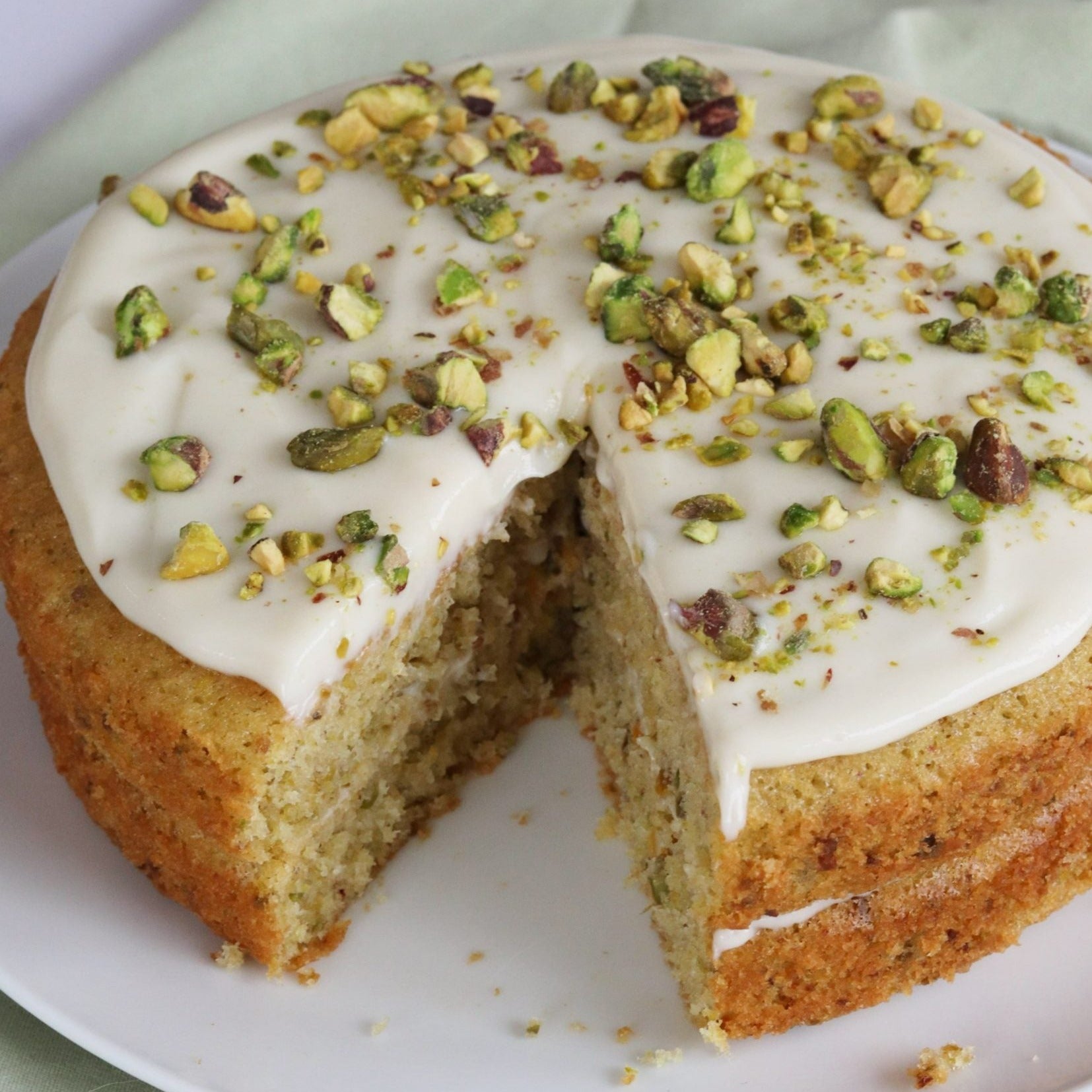 Experience a unique blend of flavors with our signature Matcha Cardamom Carrot Cake. Indulge in the rich earthy taste of matcha combined with the warmth of cardamom, all beautifully intertwined with the freshness of carrot.