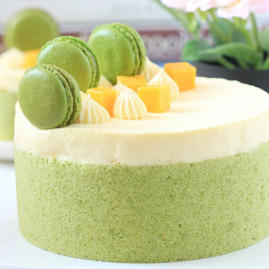 This matcha mango cake is made with soft matcha vanilla sponge cake, finished with creamy matcha ganache and decadently topped with matcha macarons. A great gift for a family or a treat for a special someone to enjoy over and over. Delivered to you across Dubai and the UAE.