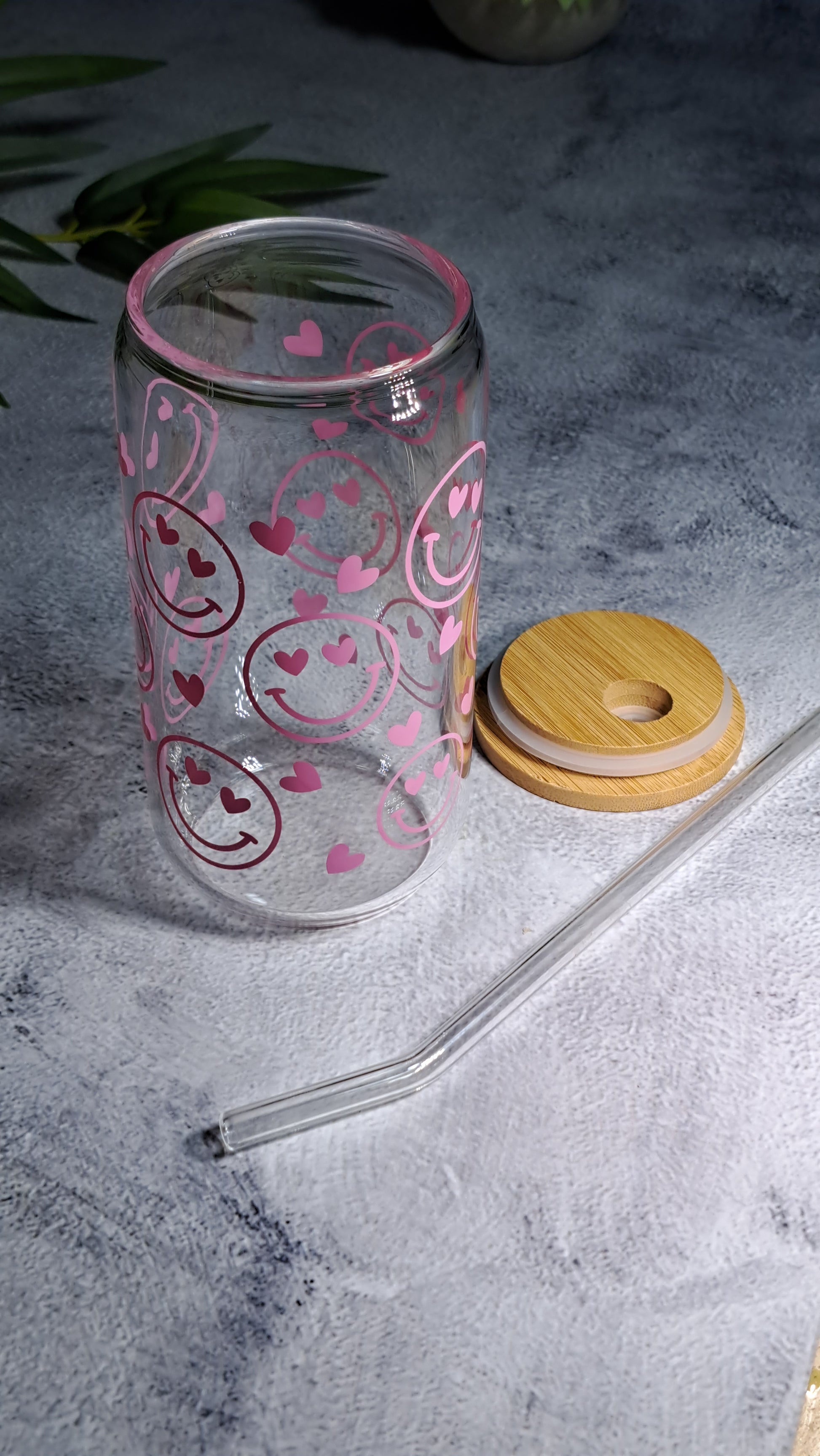 Pink Smiley Cute Iced Tea Drinking Glass with Bamboo Lid and Glass Straw - 500ml. Perfect for birthdays, housewarming gifts, tea sets, graduations, weddings, bachelorette parties and Christmas gifts.