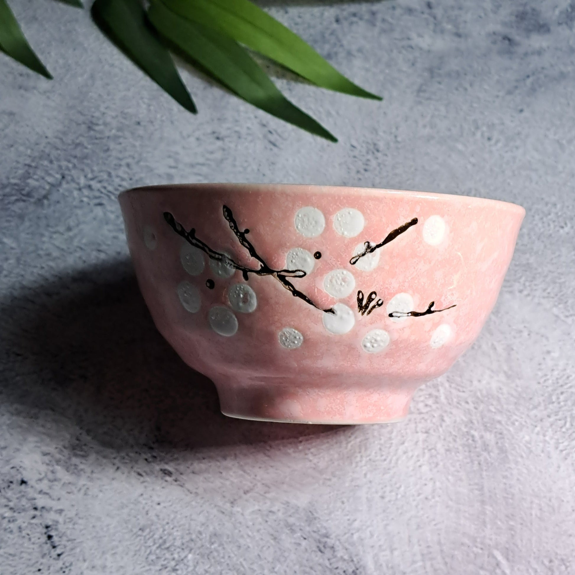 An authentic, hand-crafted ceramic pink matcha tea bowl, made for the true matcha lover who wants to recreate a traditional matcha ceremony.  Material: Ceramic, Porcelain, heat resistant  Color: Pink, White Dimensions: 11.4 cm/4.48 in x 6 cm/2.36 in Volume: 220 ml