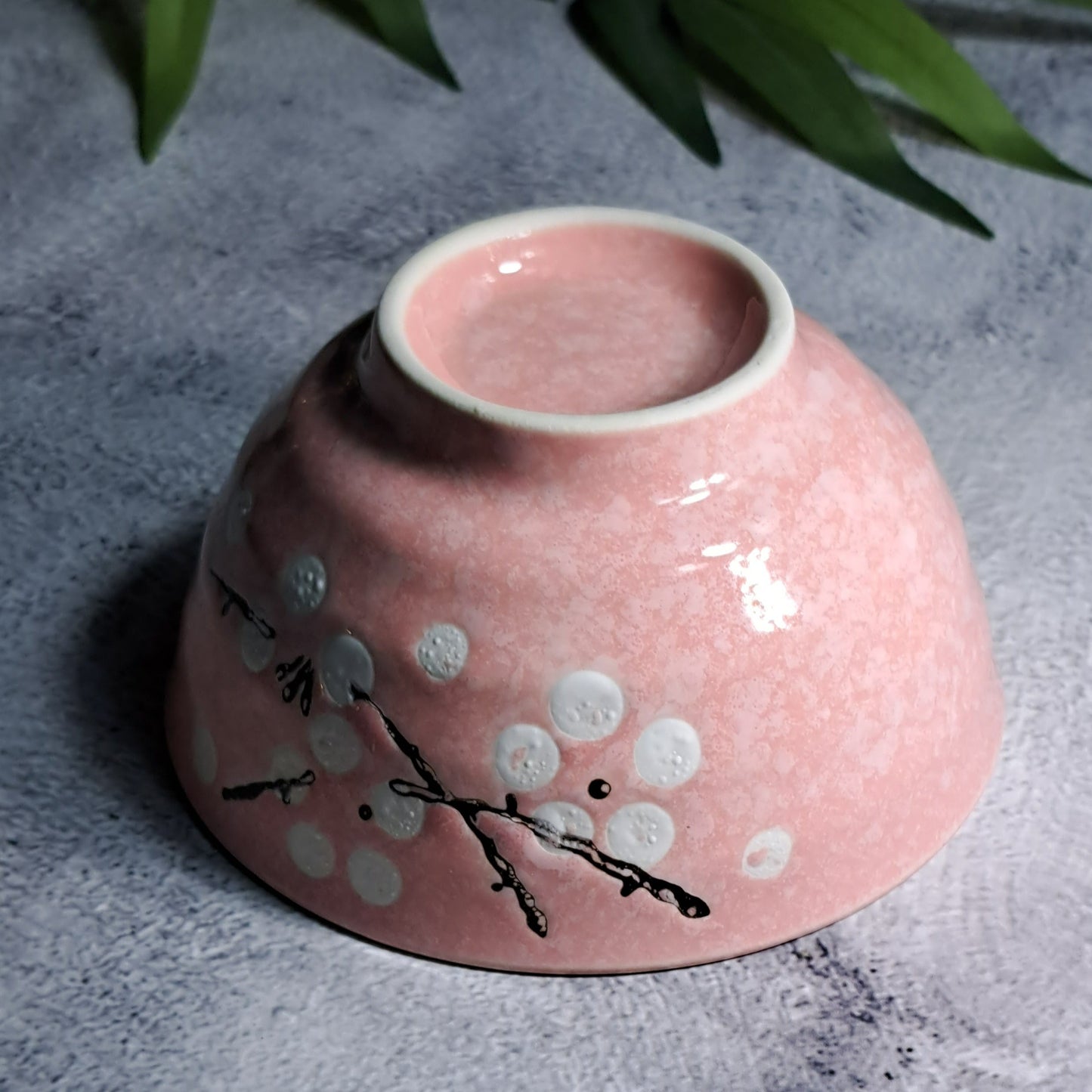 An authentic, hand-crafted ceramic pink matcha tea bowl, made for the true matcha lover who wants to recreate a traditional matcha ceremony.  Material: Ceramic, Porcelain, heat resistant  Color: Pink, White Dimensions: 11.4 cm/4.48 in x 6 cm/2.36 in Volume: 220 ml