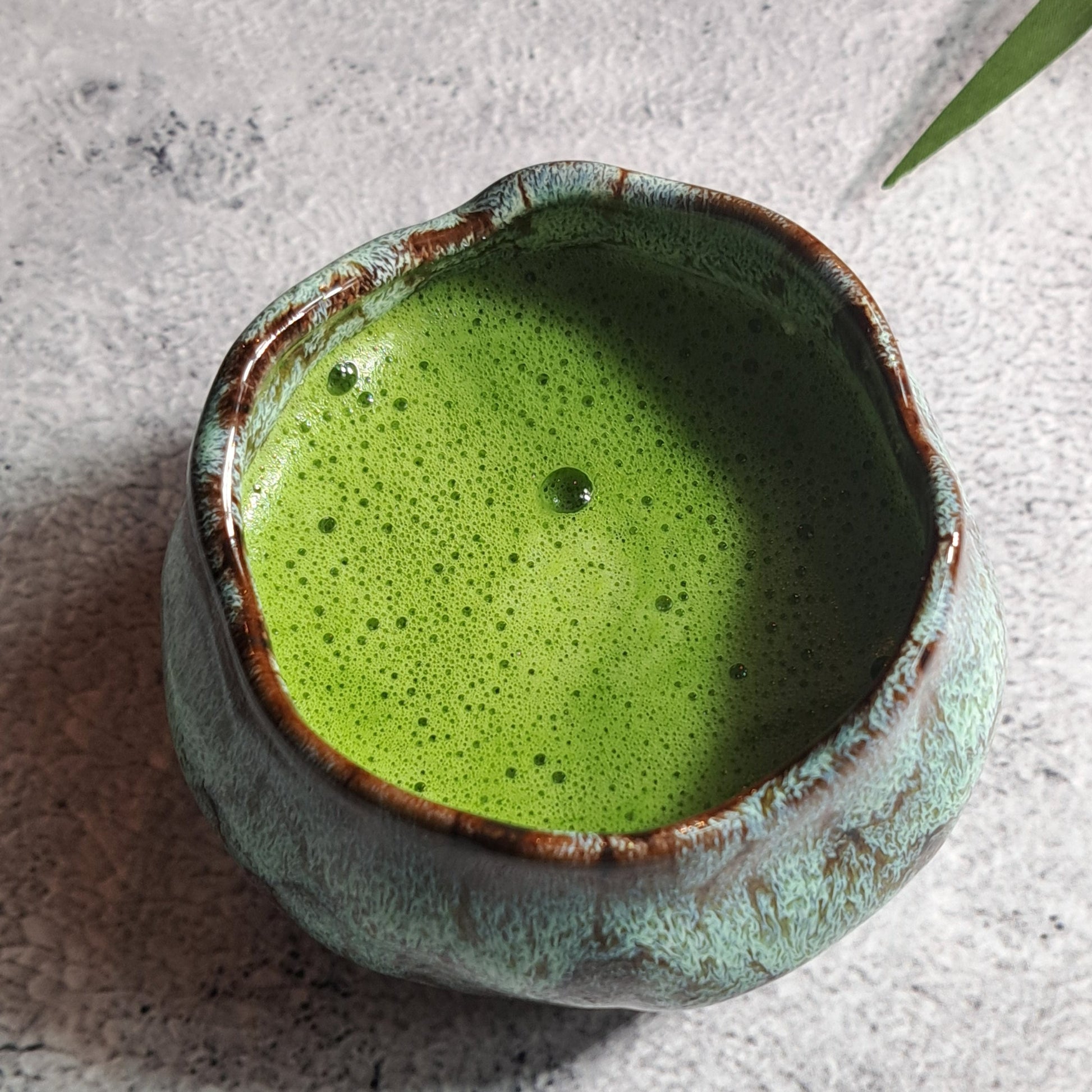 Ceramic Blue Brown Matcha Tea Cup - Cyan Glaze 160 ml. An authentic, hand-crafted ceramic matcha tea cup, made for the true matcha lover who wants to recreate a traditional matcha ceremony.