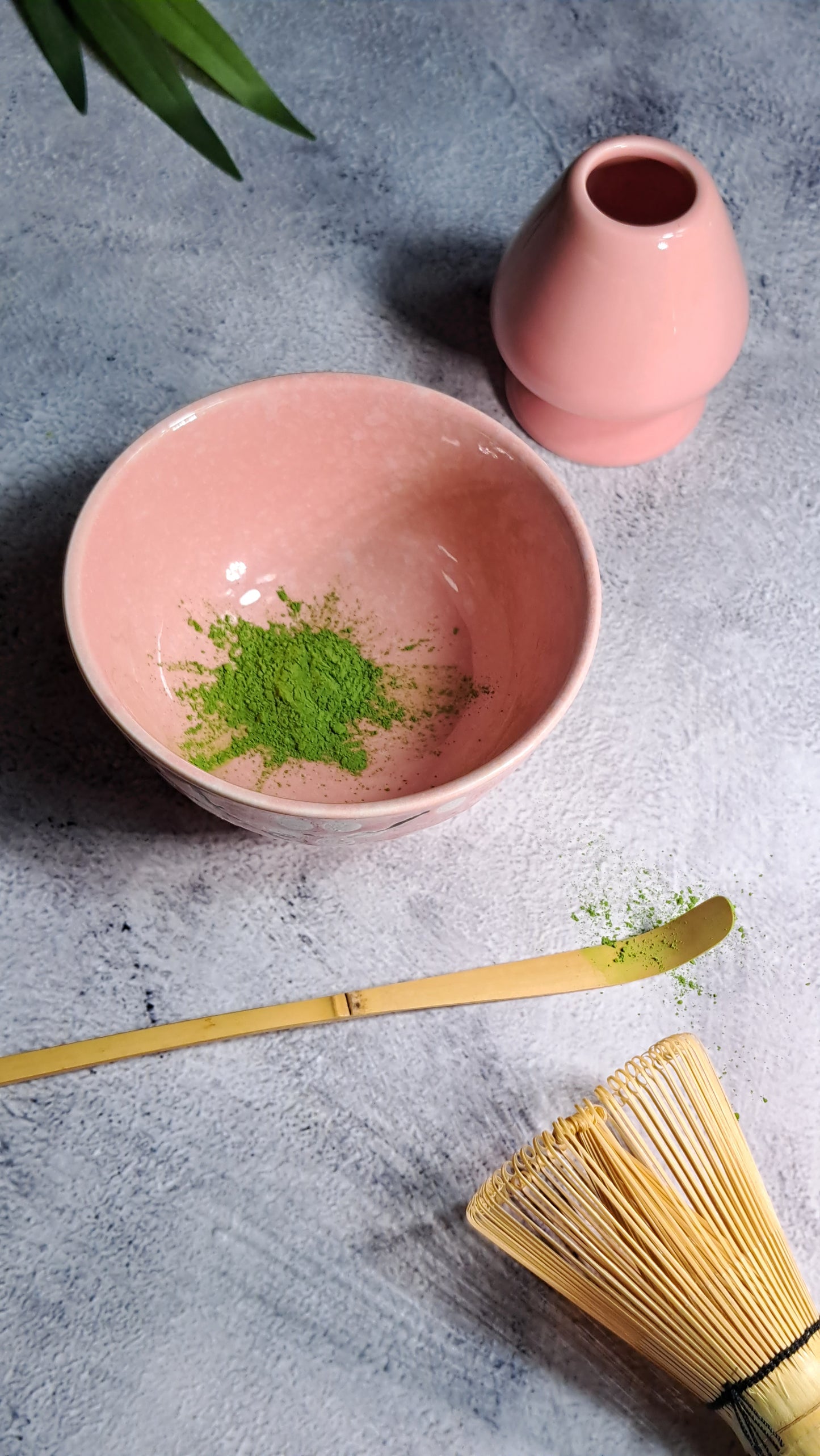 A pink 4-piece set of essential tools to brew your Organic Matcha Tea the Japanese style. 1. One Naoshi (Whisk Holder) 2. One Chawan (Matcha Bowl)  3. One Chasen (Golden Bamboo Whisk) 4. One Chashaku (Golden Bamboo Scoop)